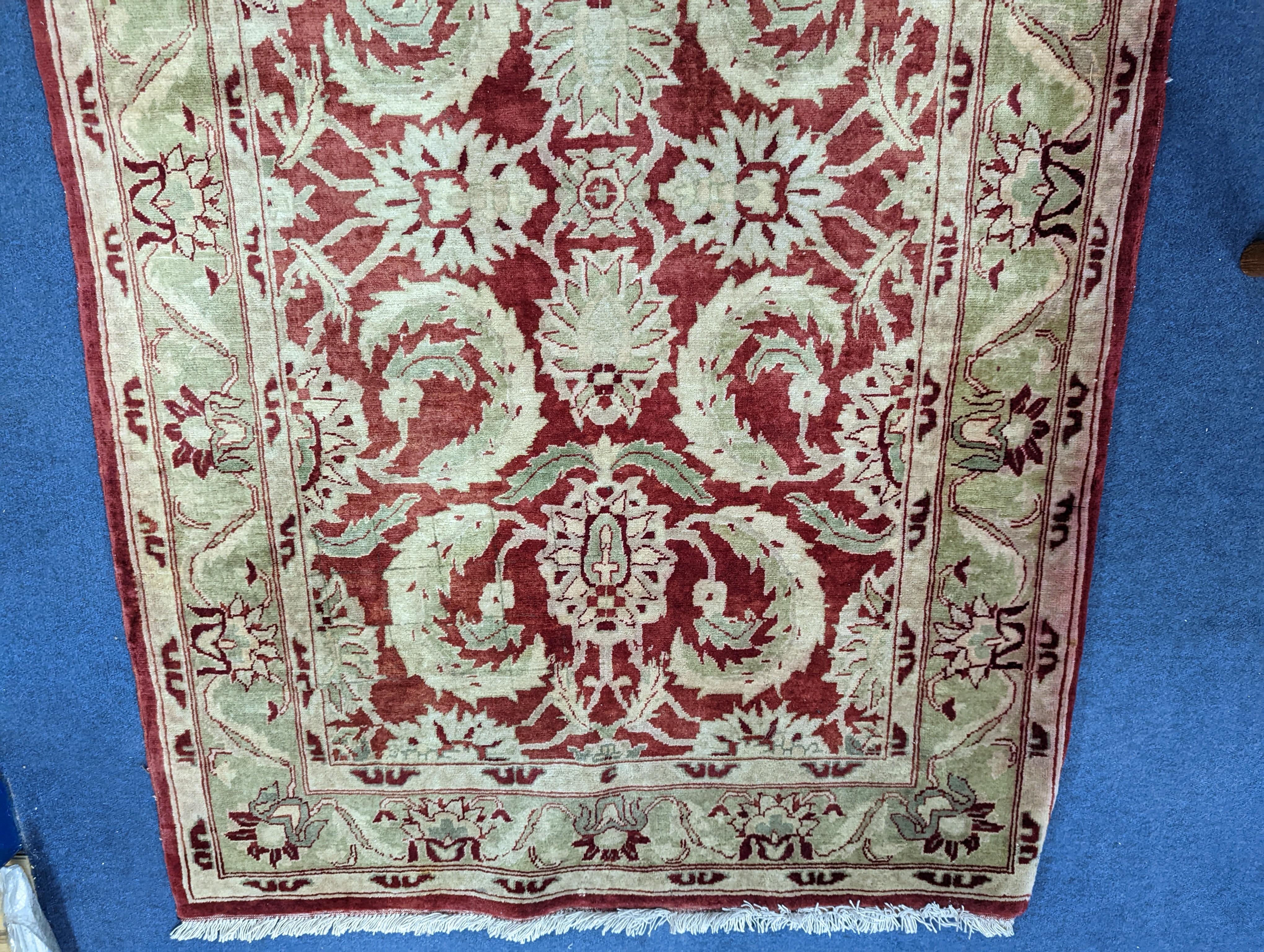 A Zeigler red ground rug, 160 x 100cm